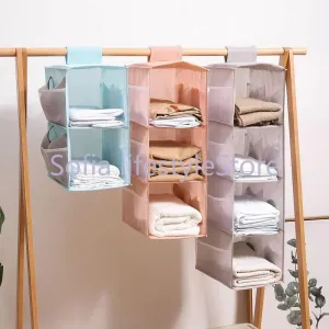 Multi-Layer Hanging Storage Bag Wardrobe Clothes Organizer . Garment organizer